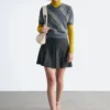 Pleated Wool Mini Skirt